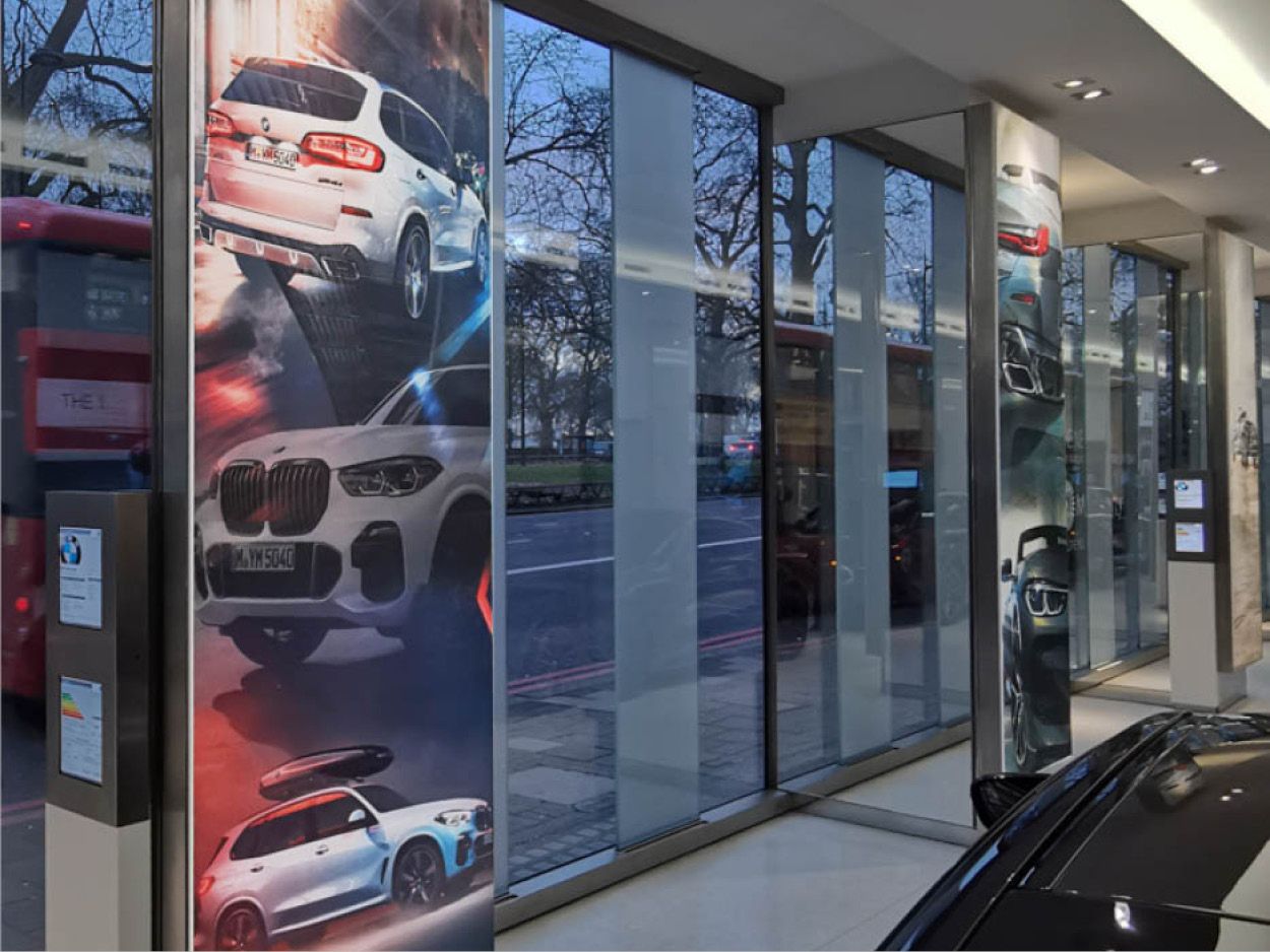 Showroom graphics on the Park Lane frontage, facing the street.