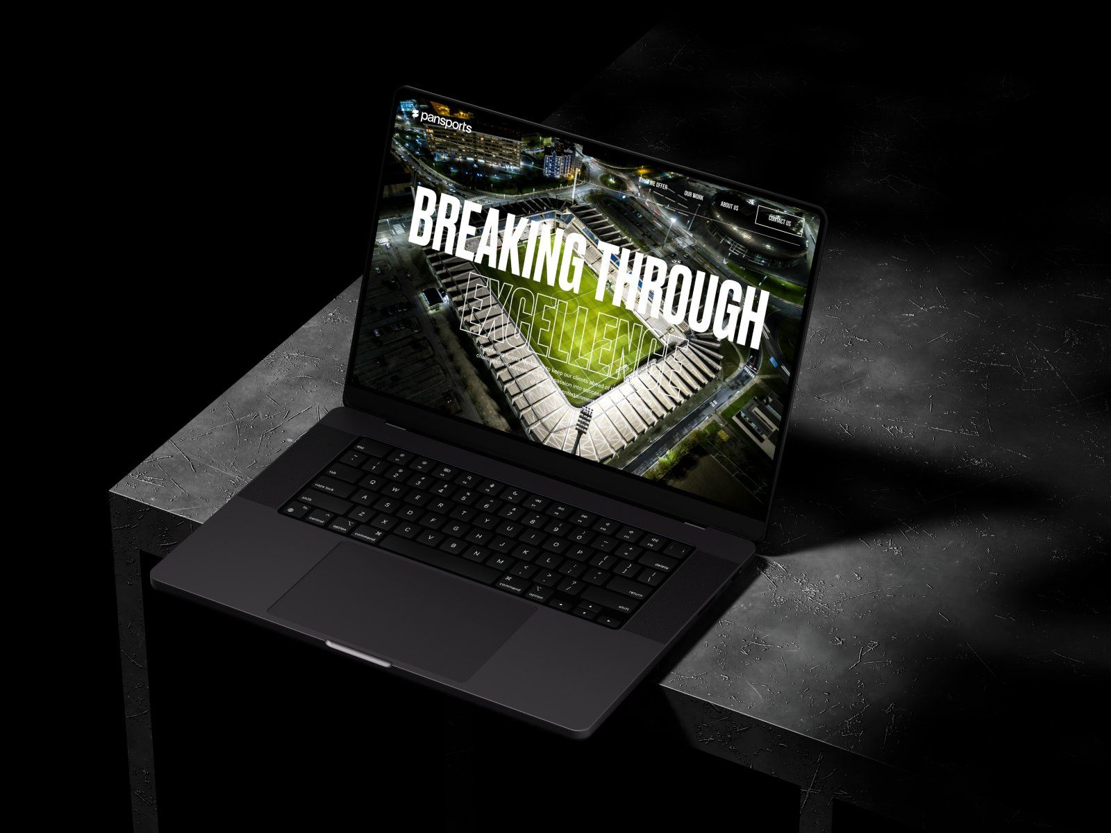 The homepage: Breaking through excellence over a floodlit stadium.